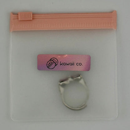Adjustable Silver Bow Ring with Pink Heart Gems – Sparkle Edition
