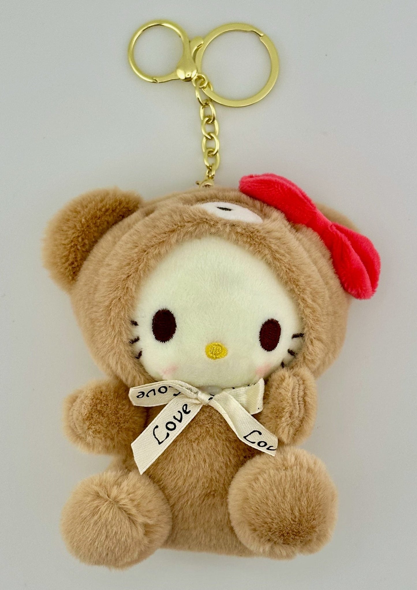 Hello Kitty Bag Charm Plush – Pink Bear Hood with Ribbon - Kawaii Co.